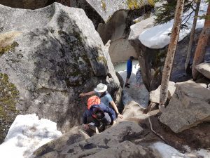 Climbing out of The Grottos ice cave