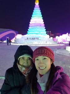 My mom and I at Harbin's Ice Festival