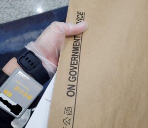 Hong Kong Quarantine bracelet and documents